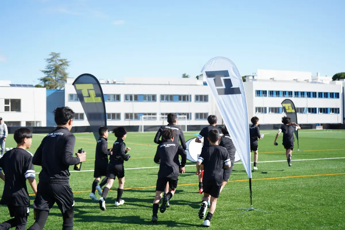 A TSG training session in Madrid — players working through a positional drill.
